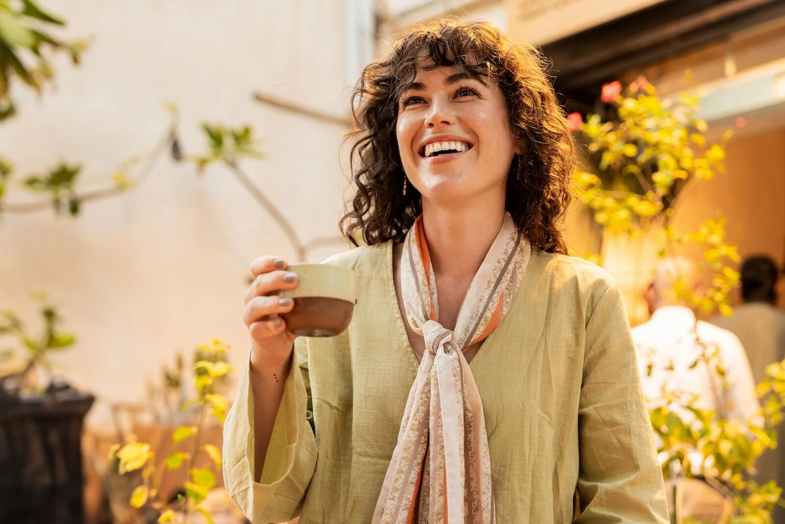 non-alcoholic cocktails in saudi arabia  - woman with coffee cup