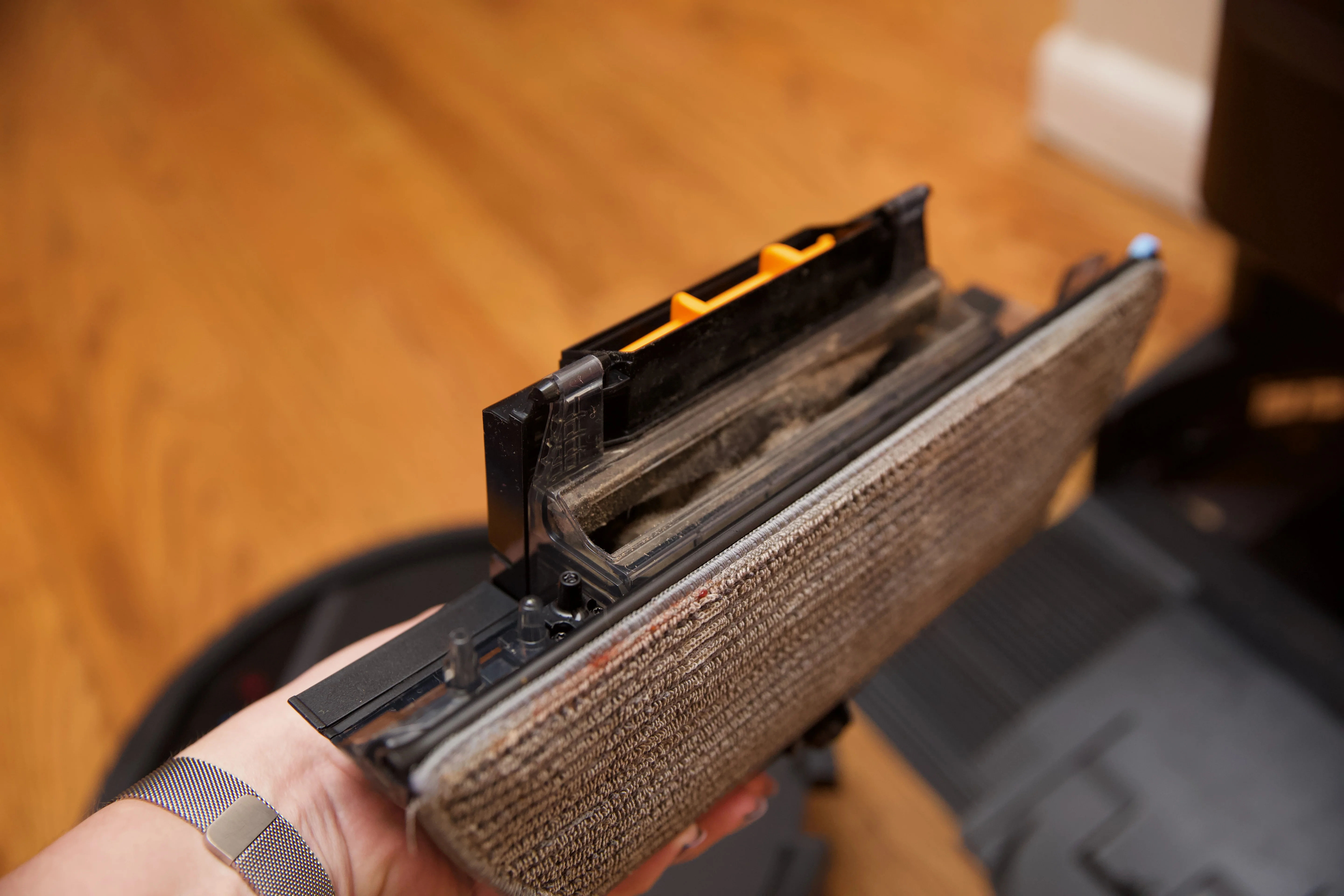 <em>The combined bin/mop/water tank is removable.</em>